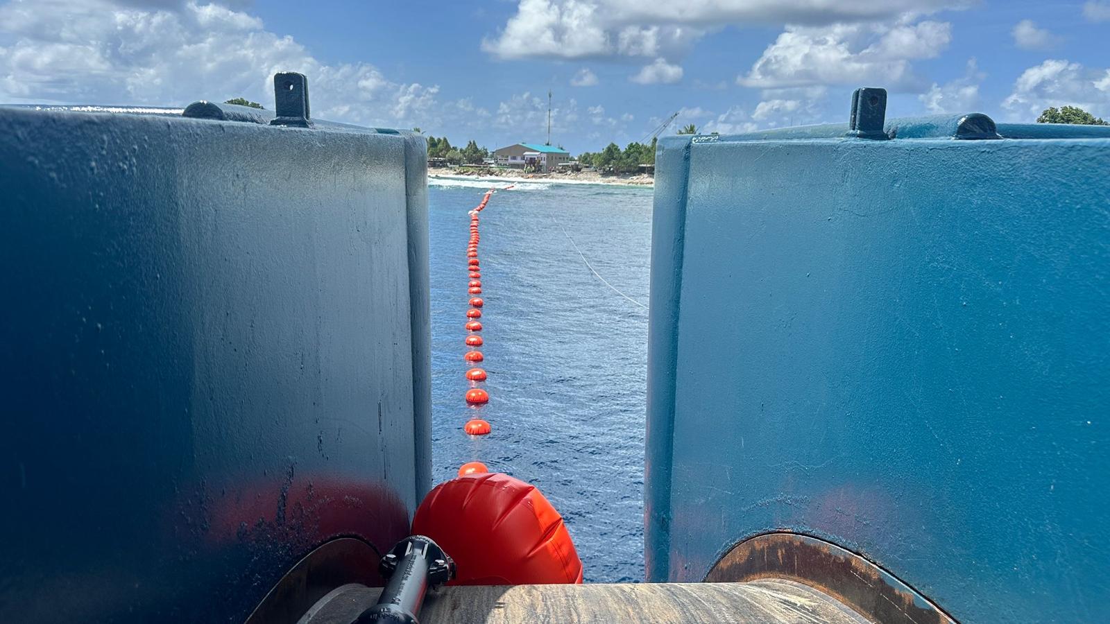 Laying of the Tuvalu Vaka cable as seen from the main lay vessel.