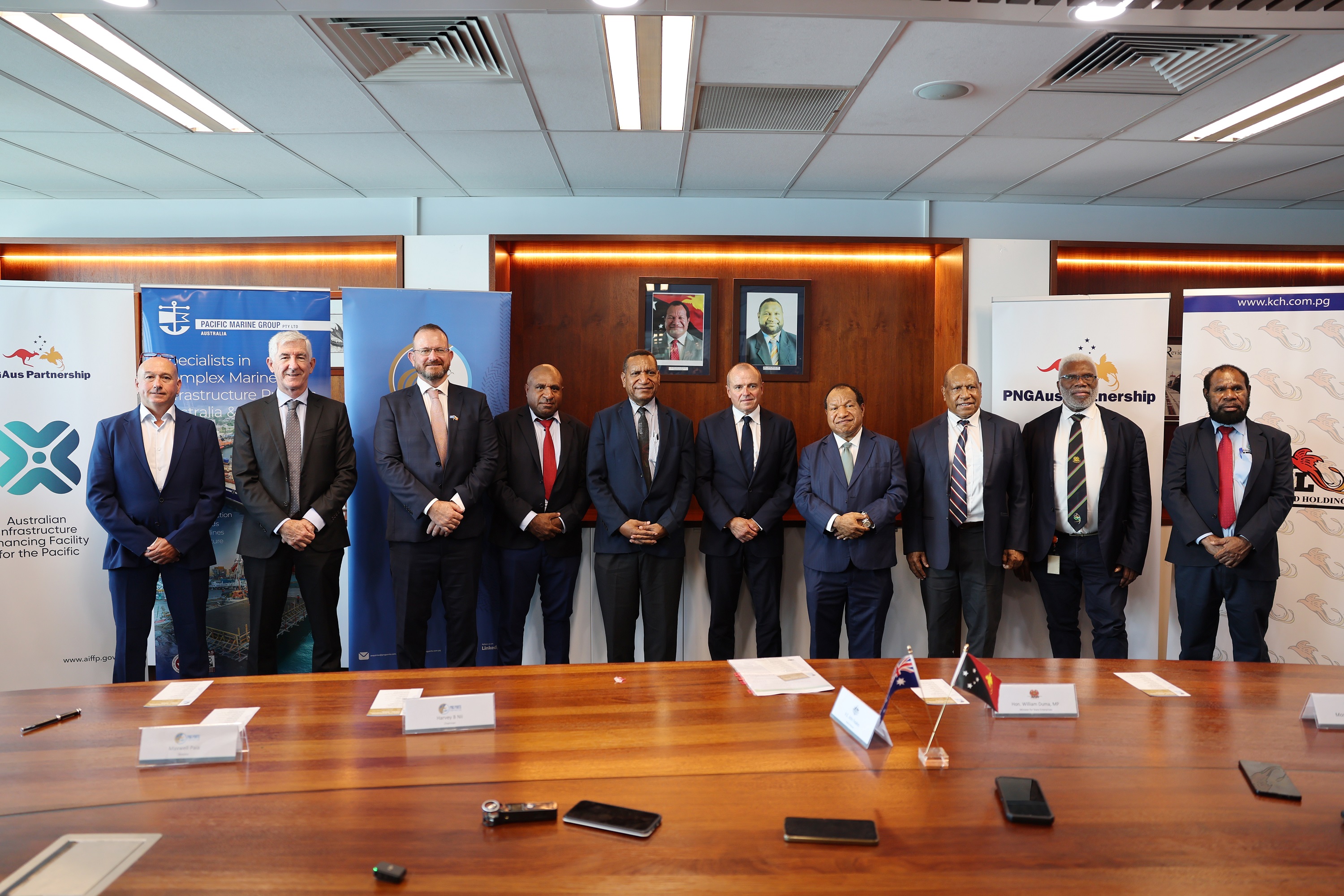 Representatives from Australia, Papua New Guinea and project partners following the Kimbe Port contract signing